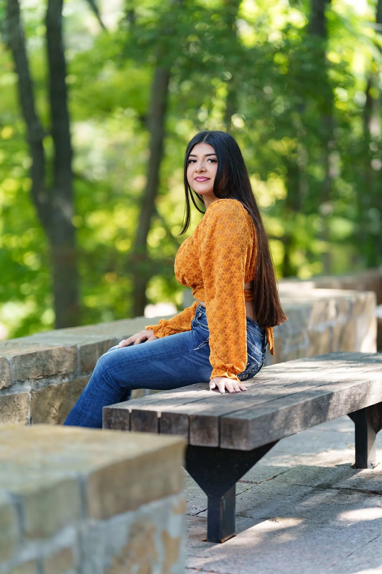 Full length pose at Fort Worth Botanic Garden during Nevaeh's boho western Save the Date quinceañera session