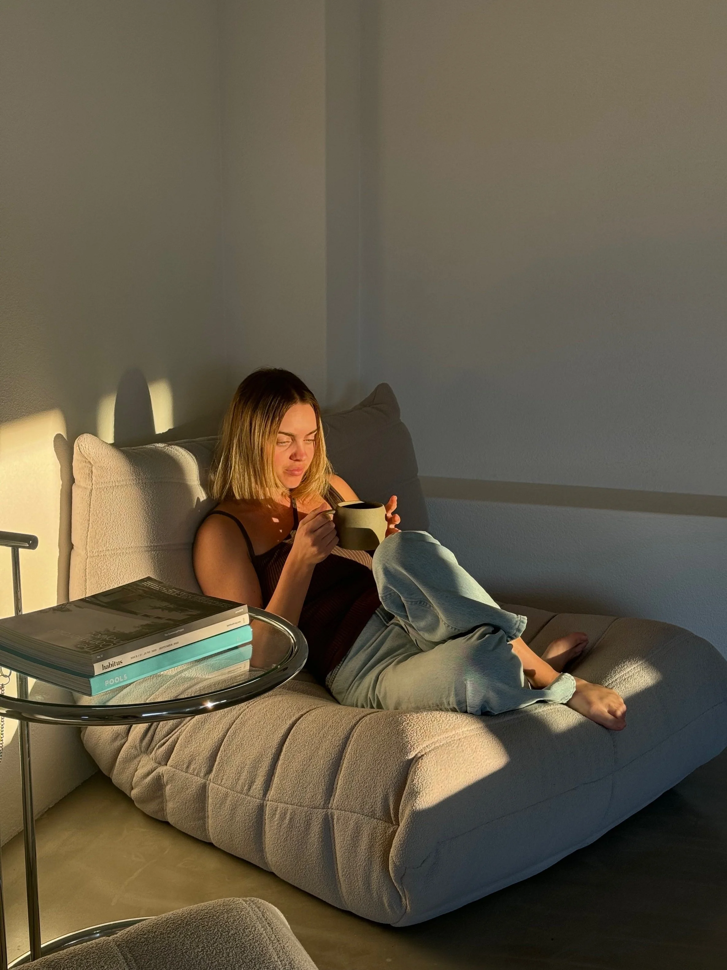 Rhi O'Hanlon of Flore Naturopathy enjoying a moment of rest, reflecting the calm and grounded approach of her naturopathic