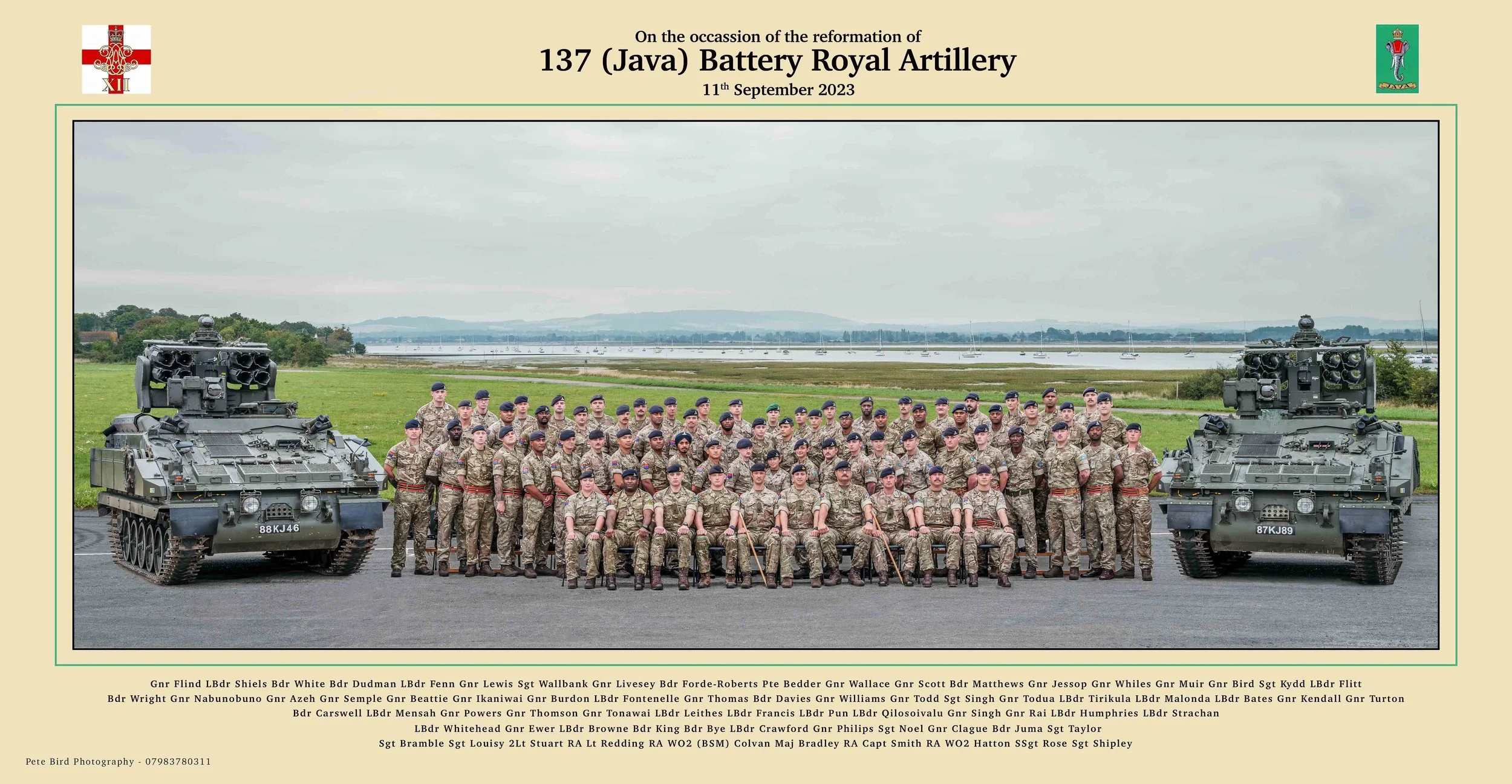 Military personnel in uniform standing in front of tanks during a reenactment event for the 137th Java Battery Royal Artillery on September 11, 2023.