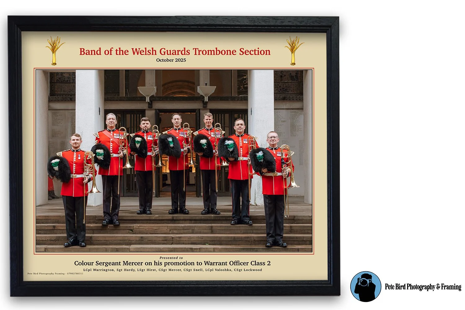 A framed photograph of seven band members dressed in red uniforms, holding brass instruments, standing on the steps in front of a building, with text indicating they are part of the Welsh Guards Trombone Section, October 2025, and acknowledging Pete Bird Photography & Framing.