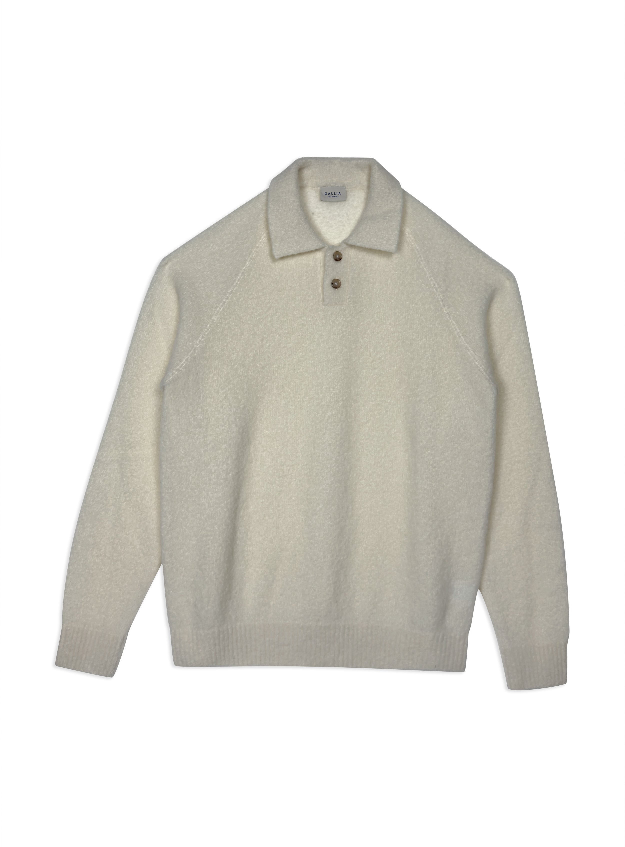 Polo Gallia a fantasia in calda e morbida lana tinta unita. Maglia di ispirazione vintage.