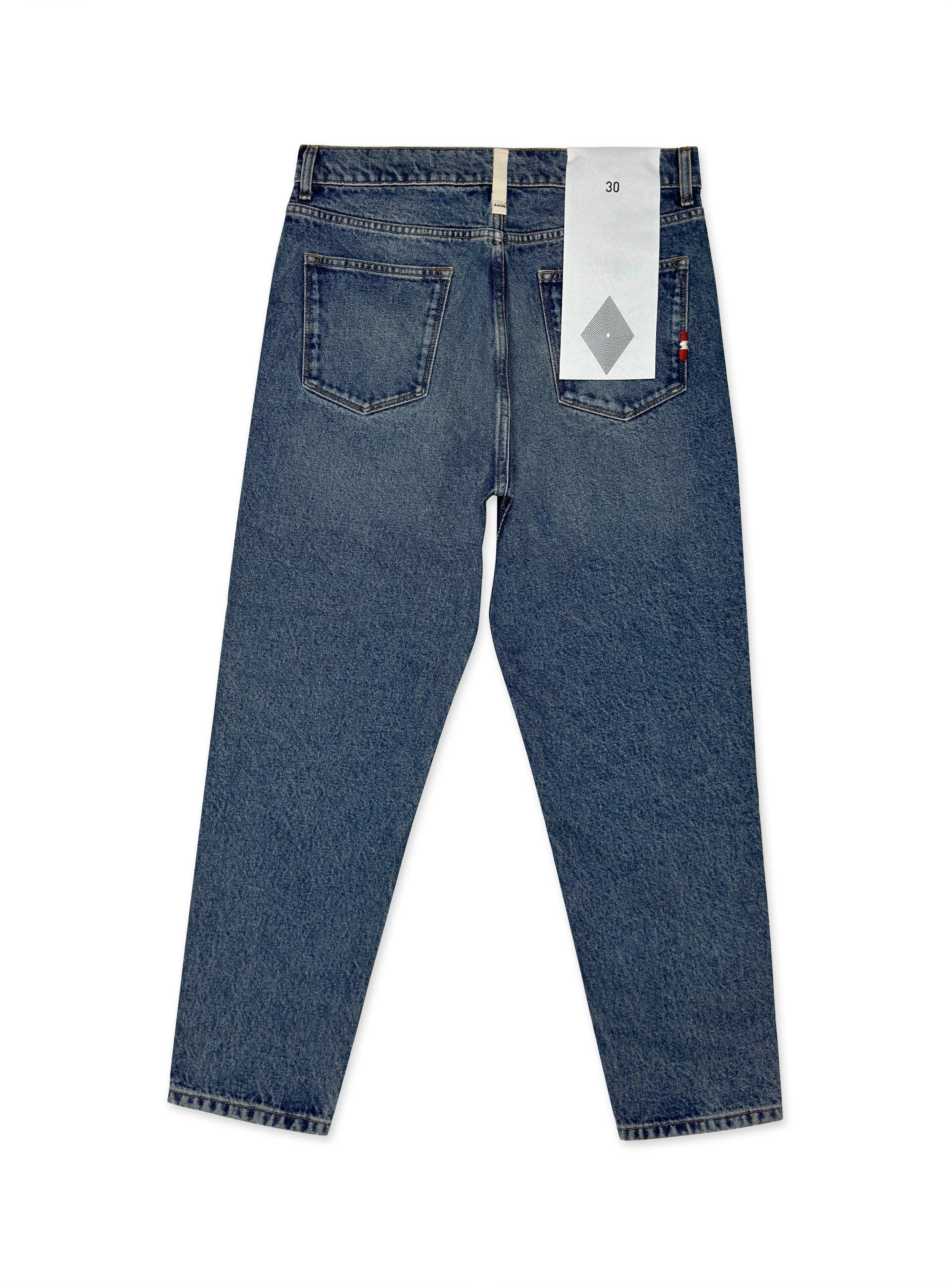 Jeans Amish lavaggio medio senza strappi. Vestibilità carrot.