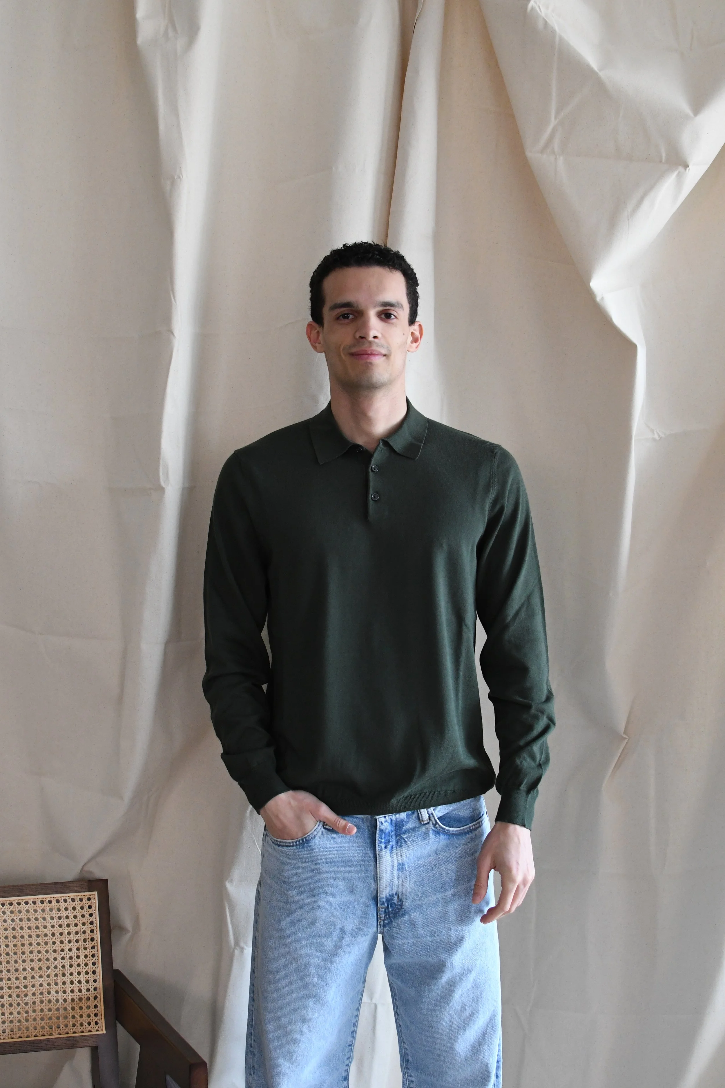 Polo Masq tinta unita a manica lunga in cotone.