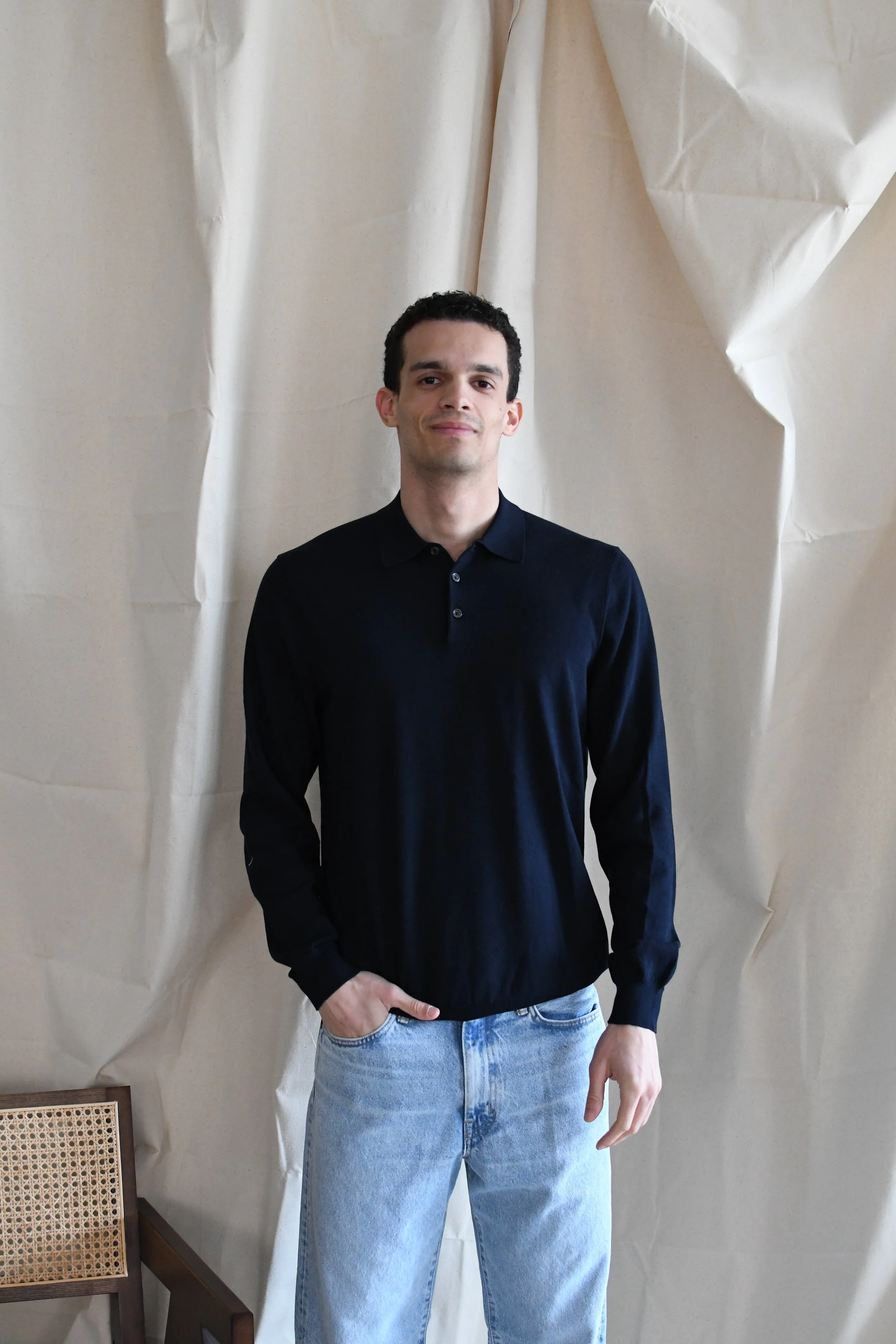 Polo Masq tinta unita a manica lunga in cotone.