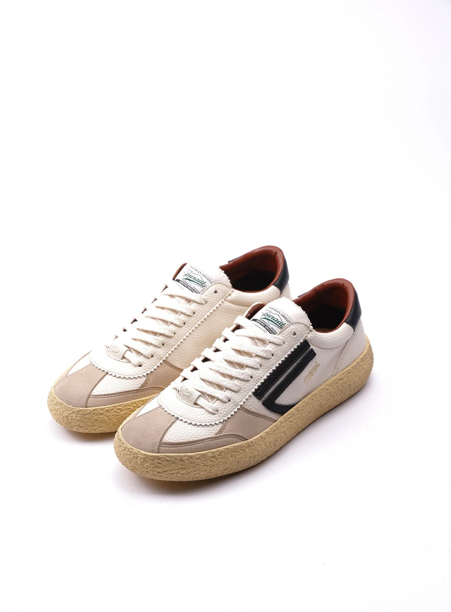 Sneakers Puraai ispirate dallo stile vintage anni 70, realizzate con materiali riciclati e biologici.