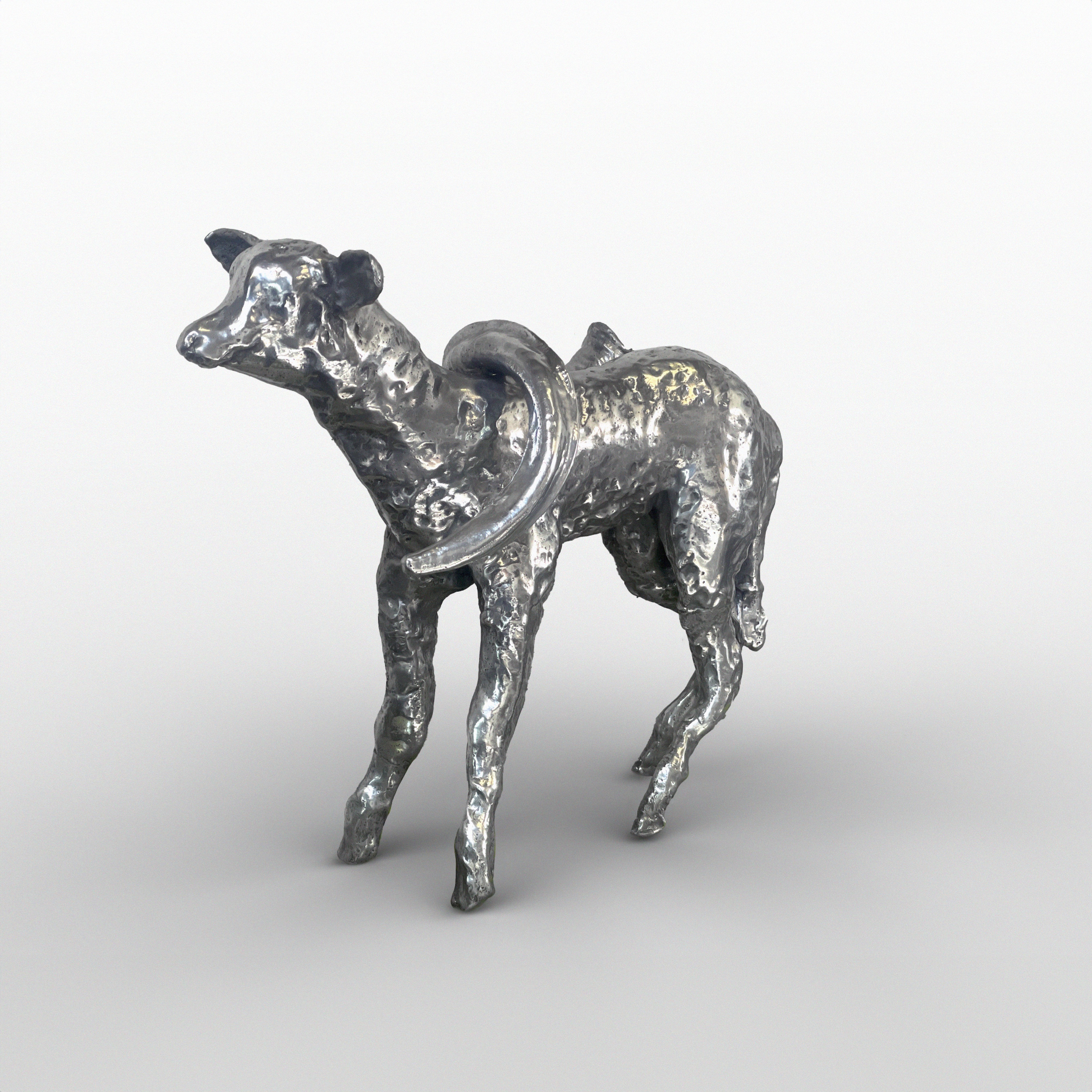 Silver sculpture of a dog with a curved tail and slender legs, set against a plain white background.