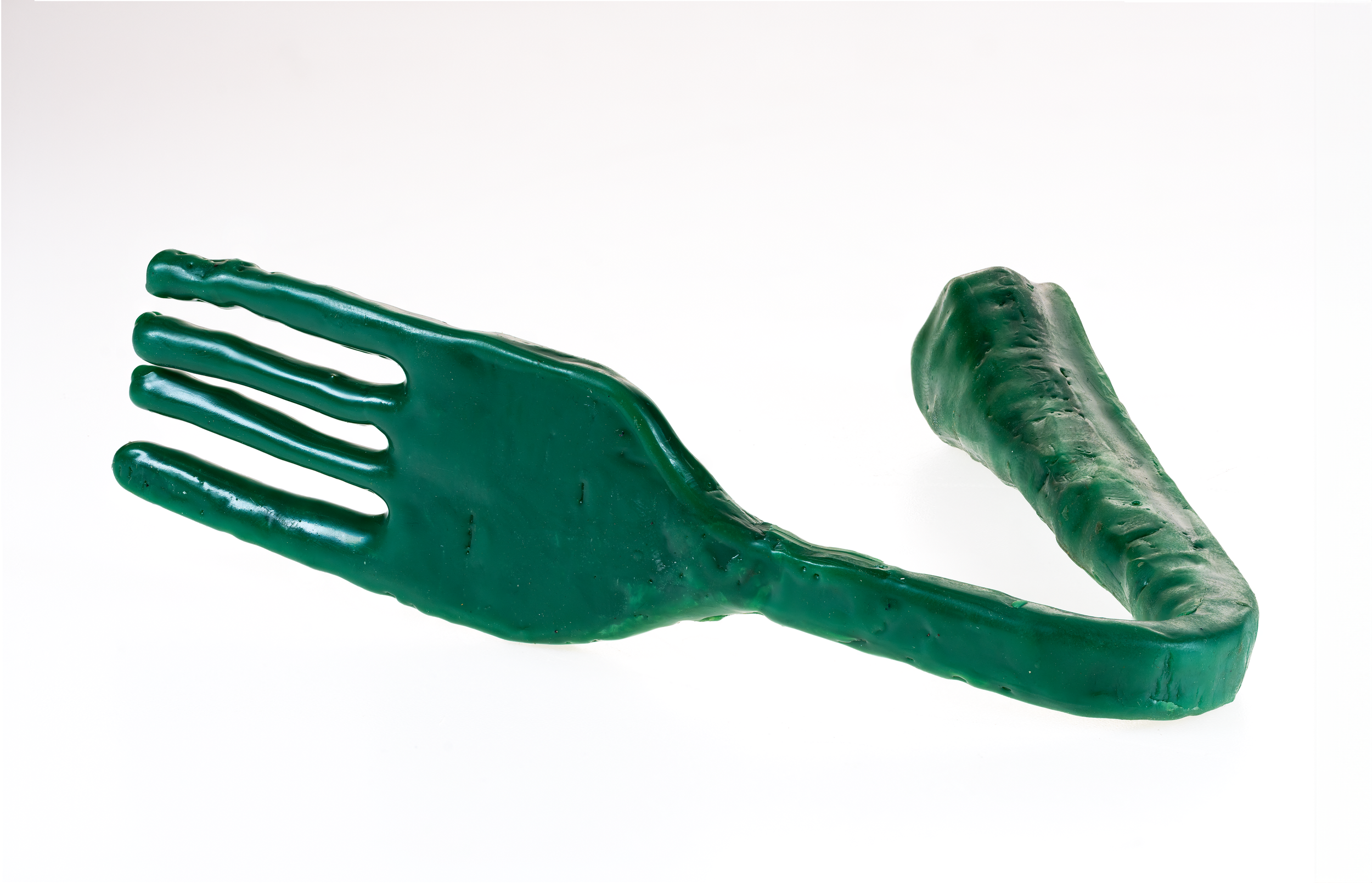 Green rubber glove attached to a green rubber glove finger.
