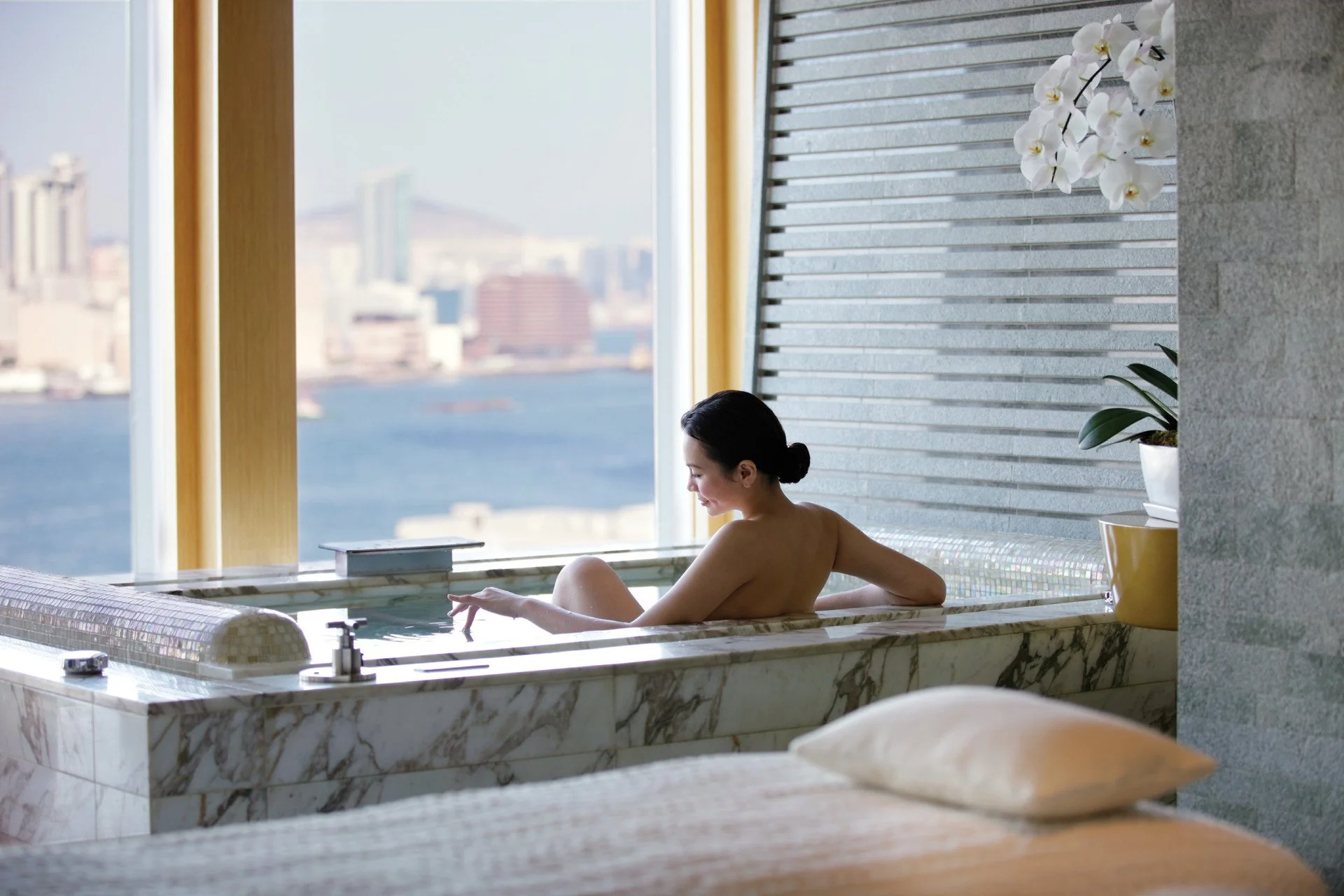 Woman relaxing in a bathtub Longevity in her future