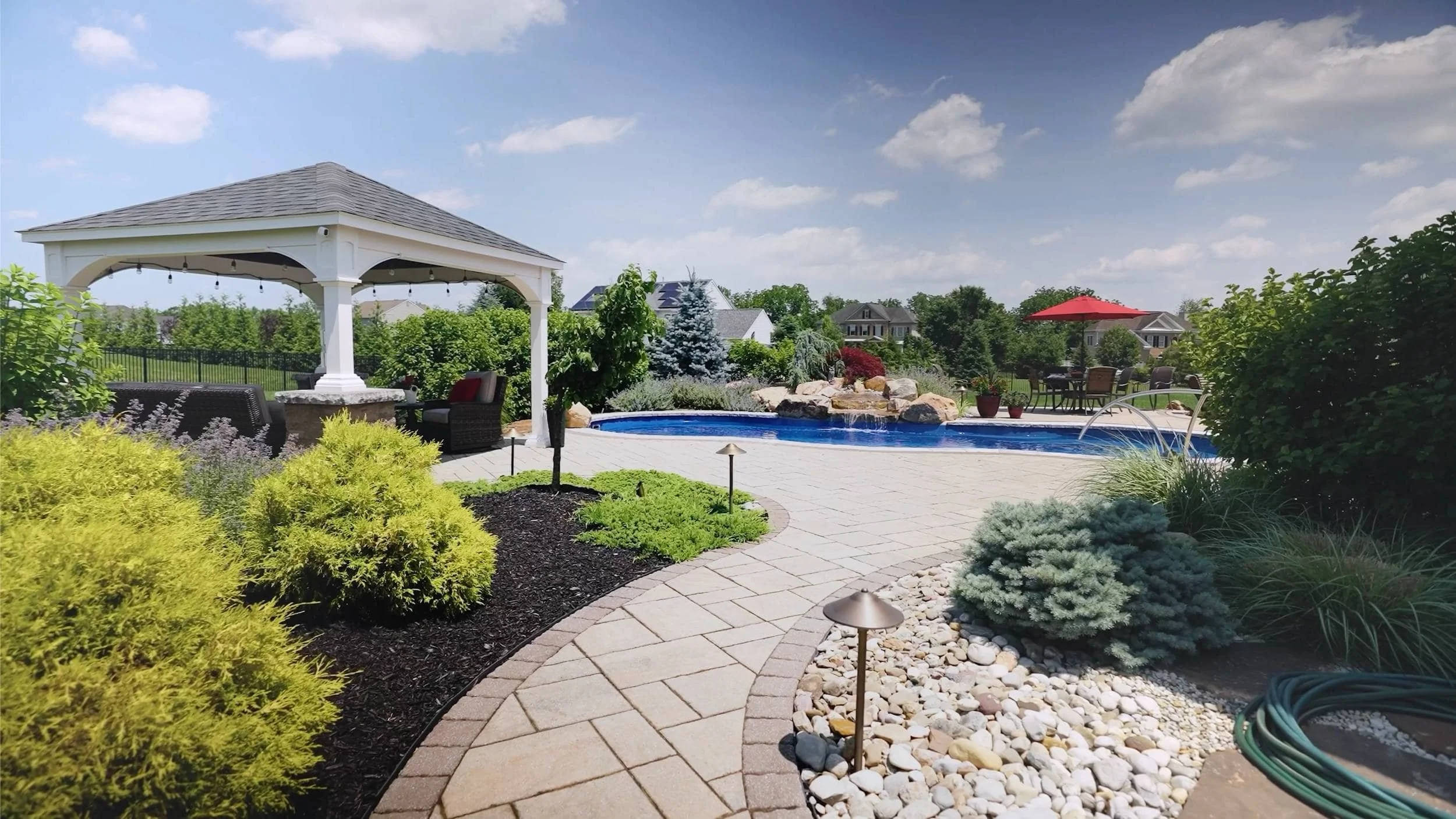 Private backyard retreat with fire pit and pergola in Hanover Township, PA