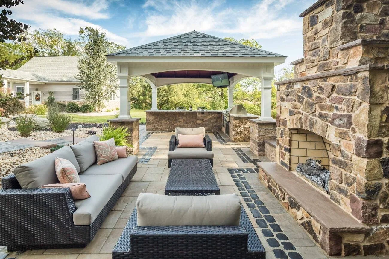 Shade structure with outdoor dining setup beneath