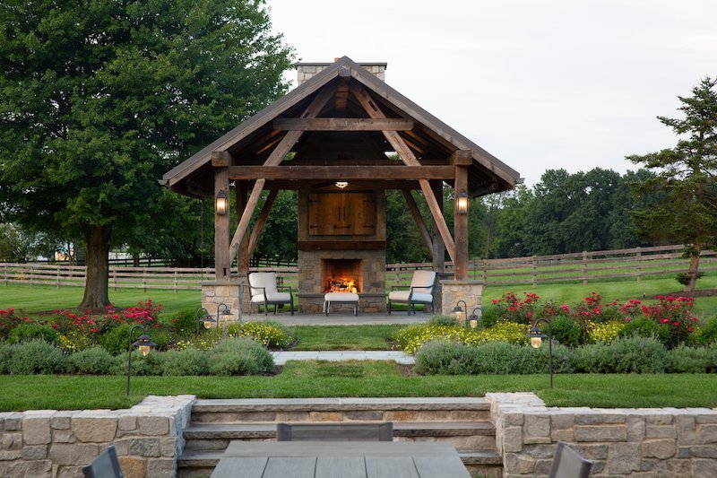 Backyard retreat featuring a timber frame pavilion