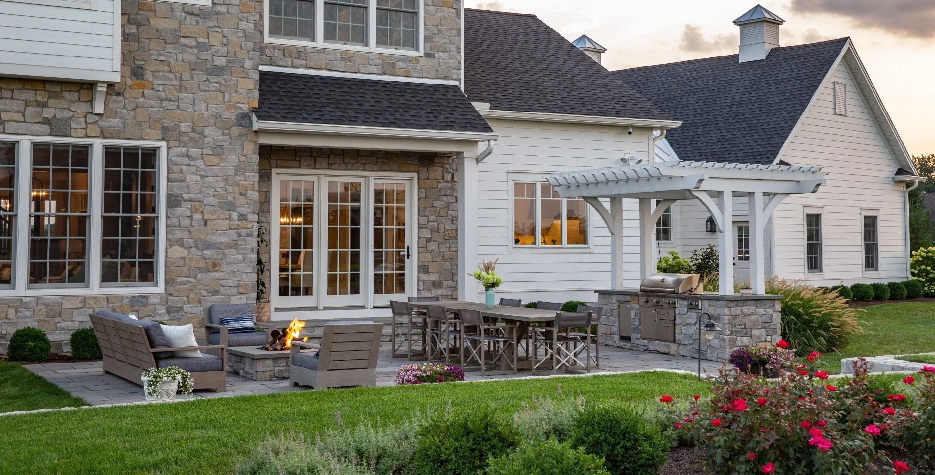 Shade structure integrated into custom outdoor living space