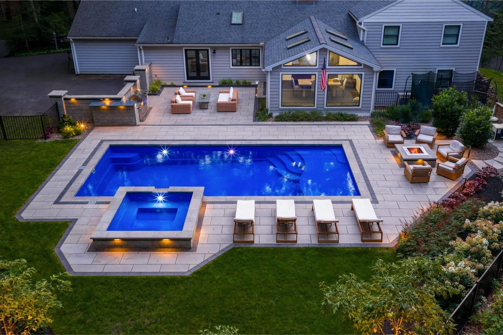 Custom paver patio and recessed dining area in Hershey PA backyard