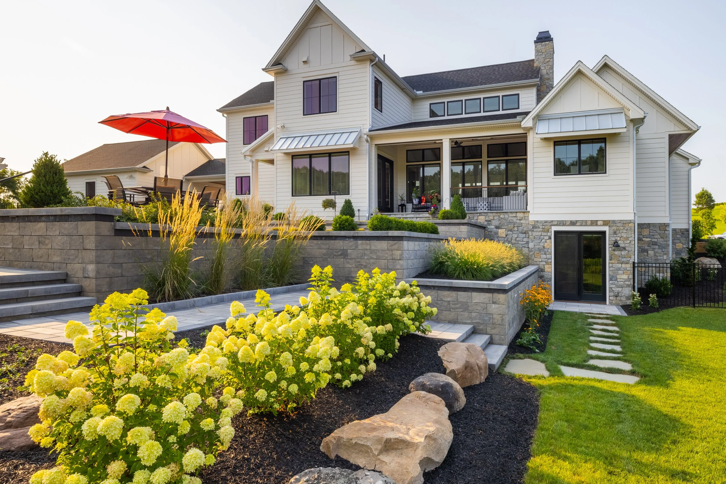 Spring landscape cleanup including pruning and debris removal