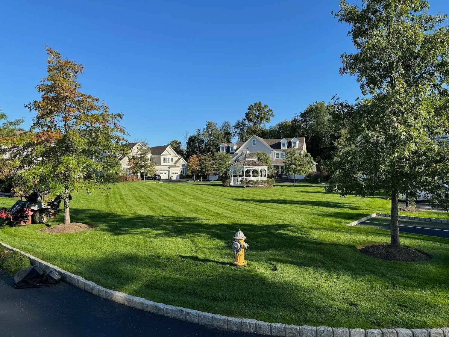 A large commercial lawn that is healthy and mowed in Westchester County, NY