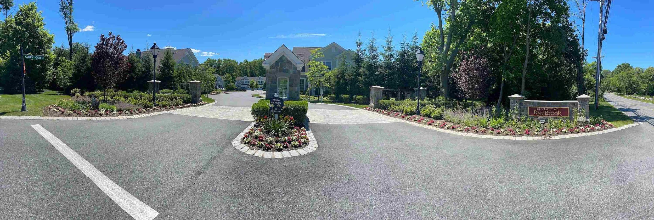 A gated community entrance with plantings in  Westchester County, NY