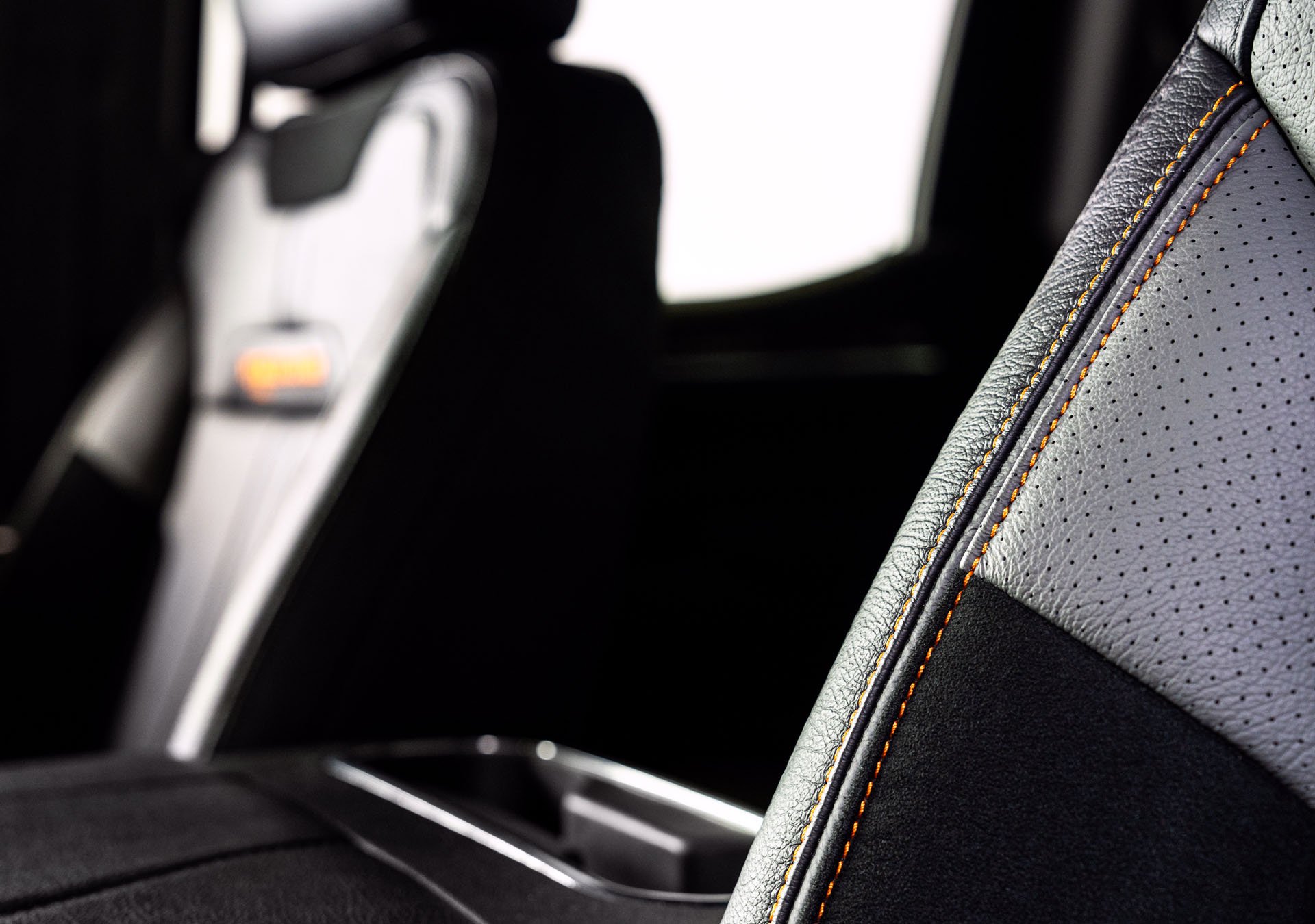 Custom Orange Stitched Two-Tone Leather Seats with Alcantara Suede Inserts and FOX Factory Embroidery
