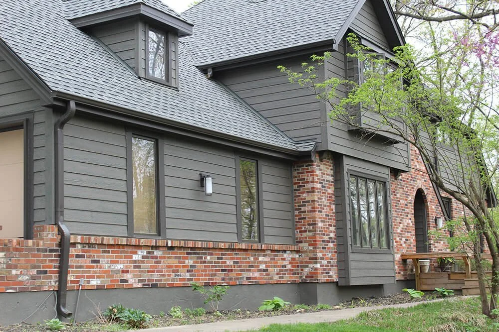 Picture of a residential house with newly installed LP Smartsiding in Dark Gray Color