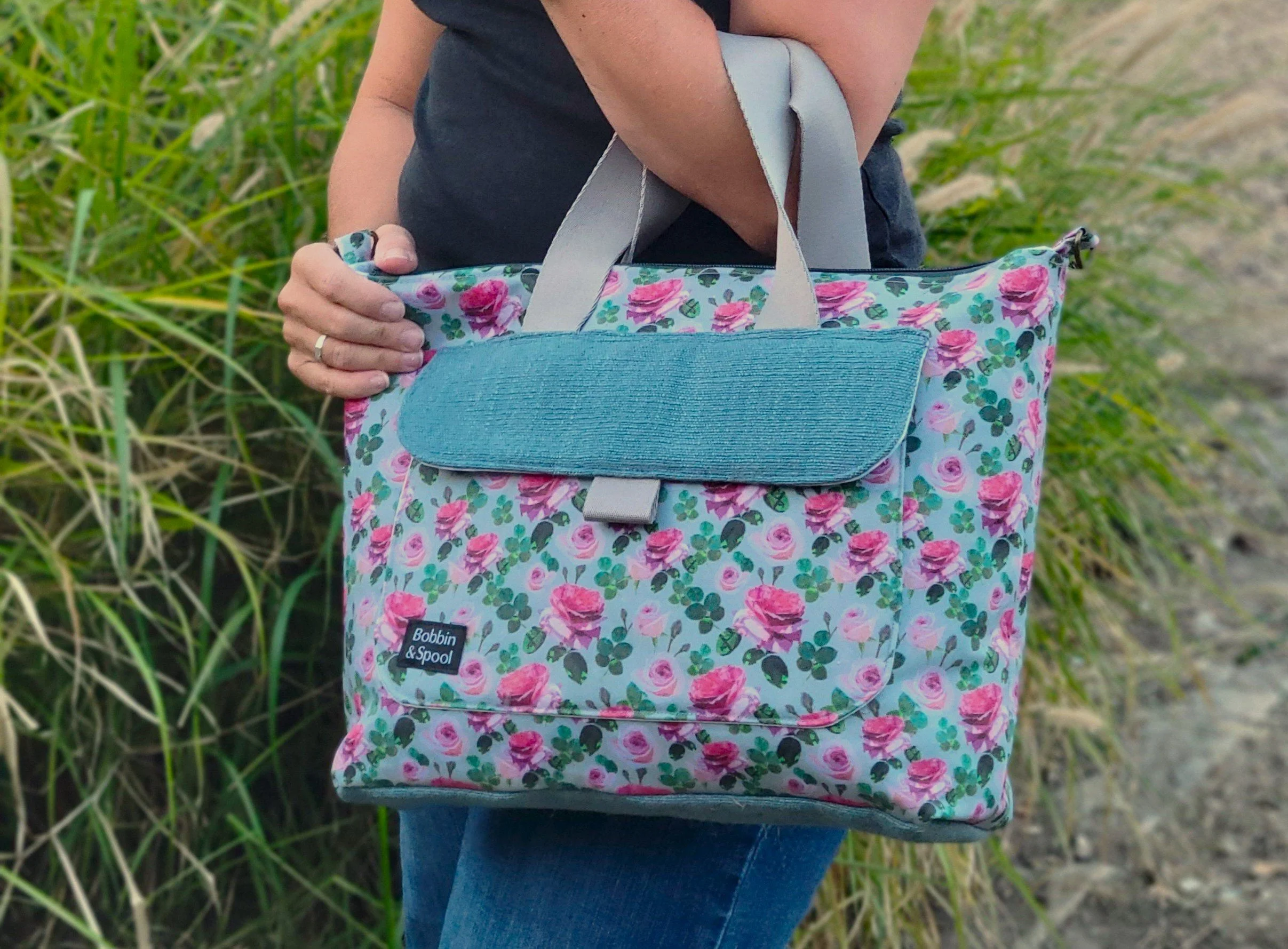 Close up view of Botanica rose tote with grab handles.jpg