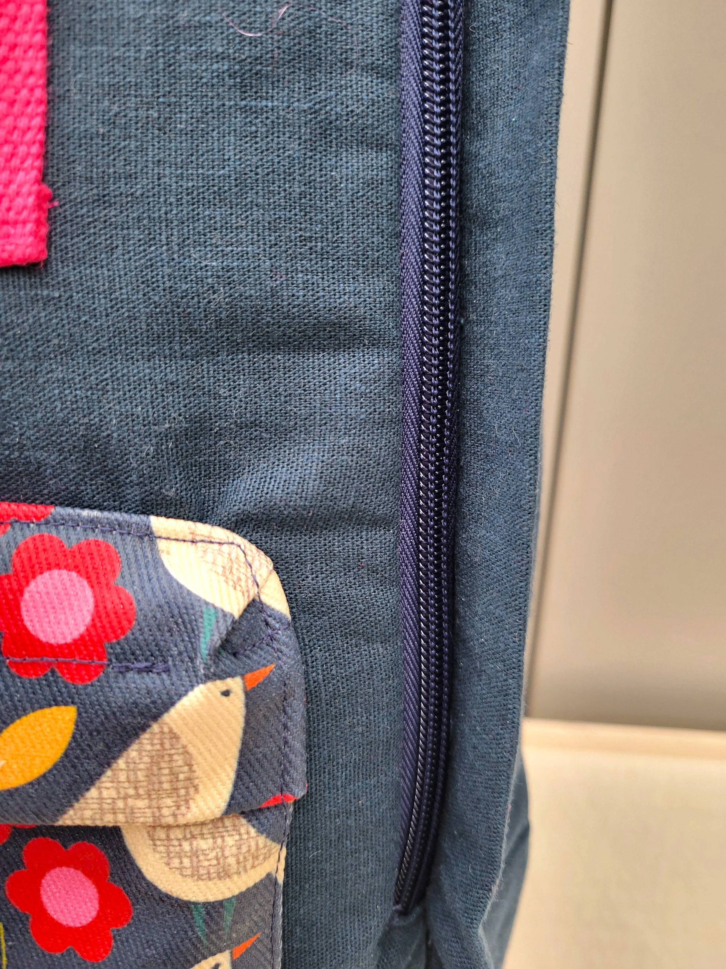 Bird-large-backpack-front-pocket-detail.jpg