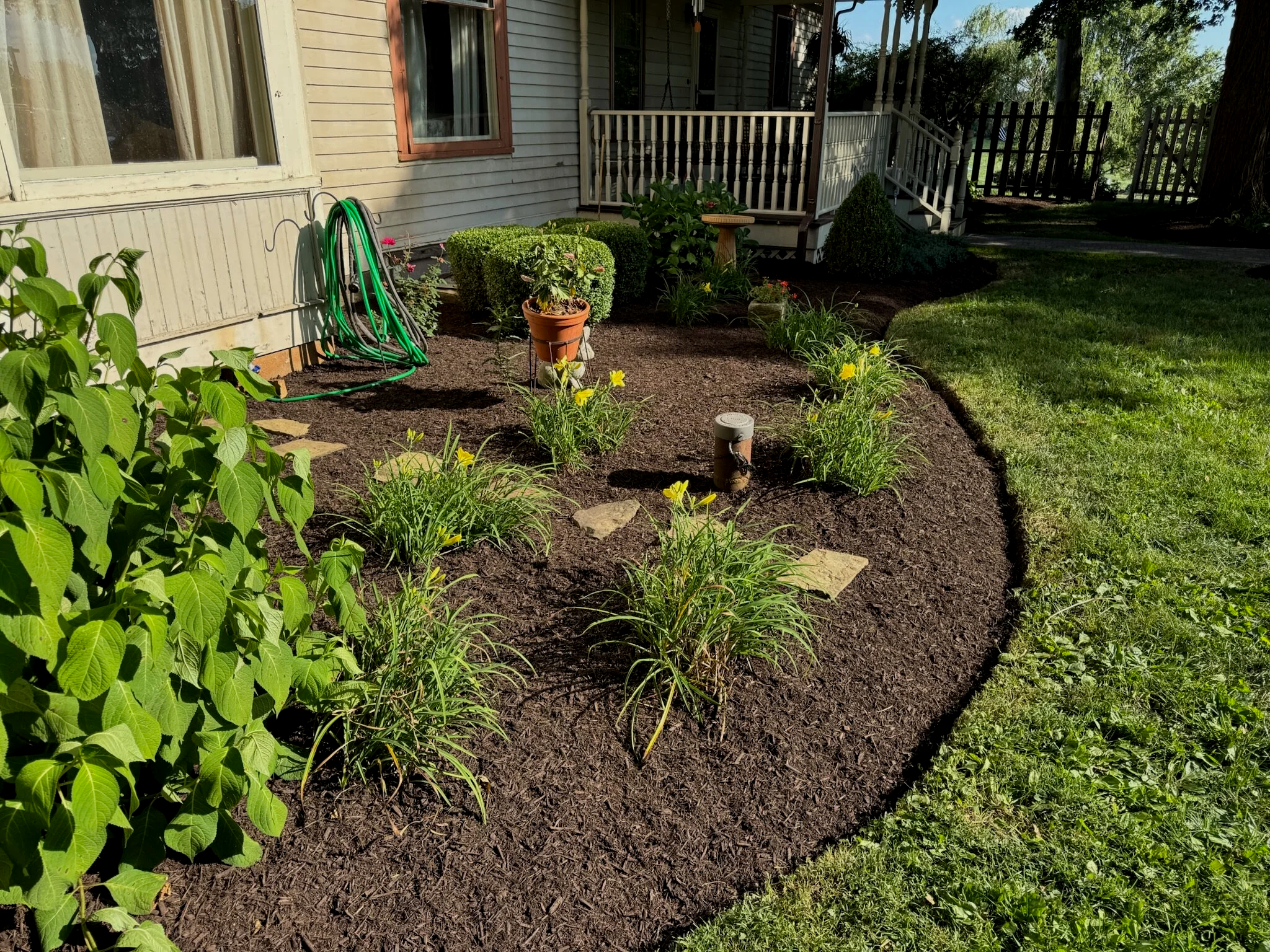 well maintained landscape beds after fresh mulch