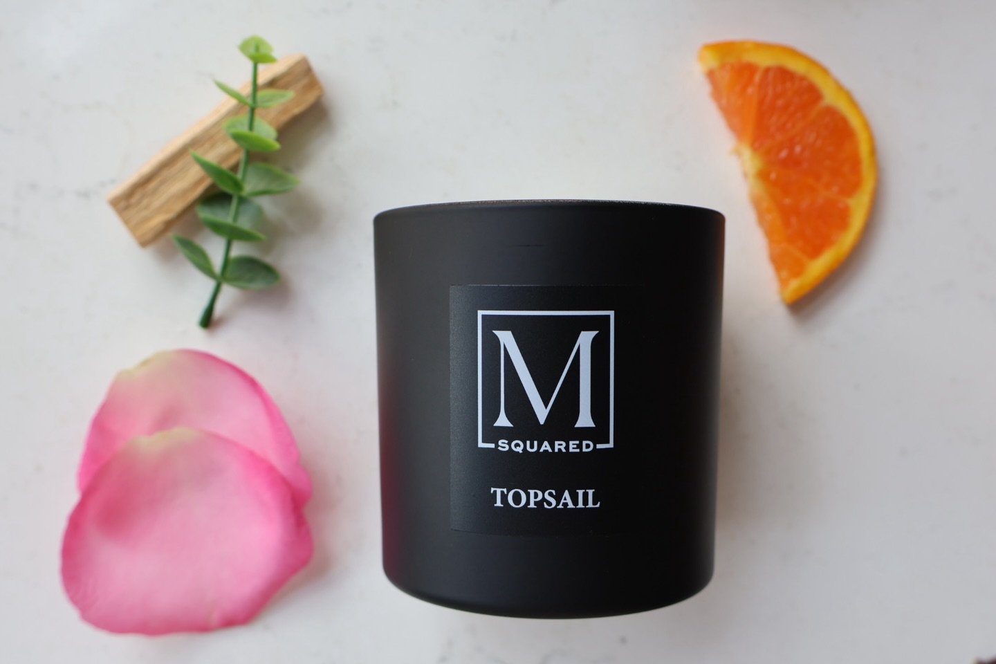 Yesterday, the home. Today, the scent.
Our TopSail candle was inspired by that North Carolina escape~ soft coastal tones, open air, and the kind of calm you wish you could bottle. 

With notes of sweet pea, jasmine, and apple, it brings that feeling 
