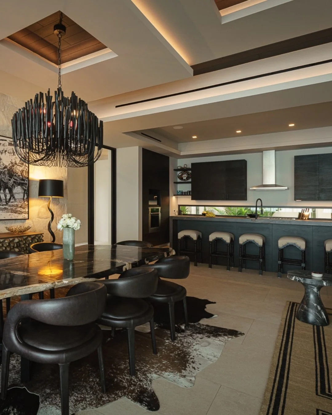 Designing a vacation home is all about creating spaces that feel effortless.

Anchored by a custom island, this Cabo space was designed for slow mornings, casual meals, and evenings spent gathered with friends and family. Open, inviting, and seamless