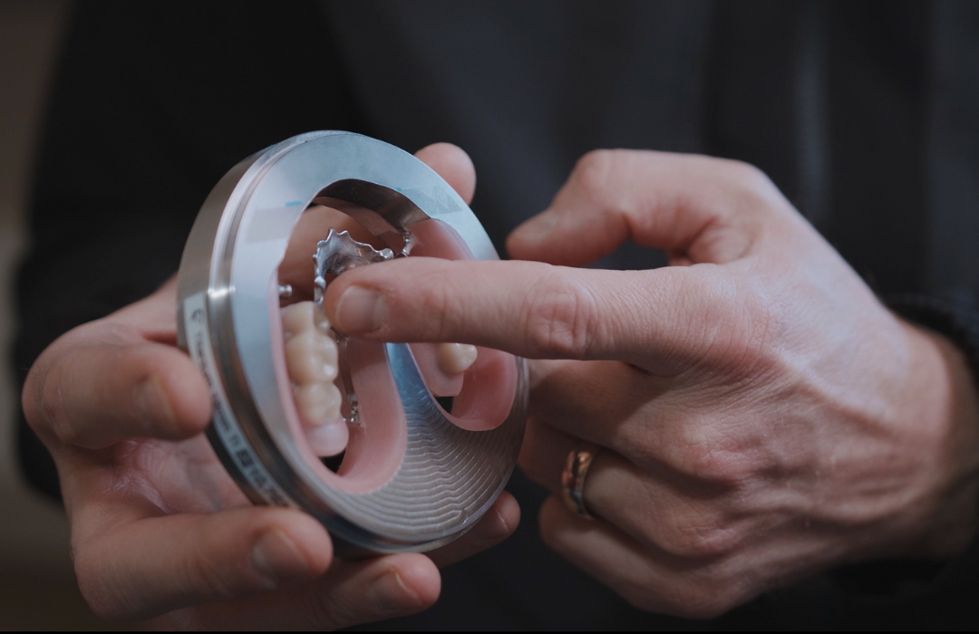 Denturist crafting a custom denture, Winnipeg denture lab