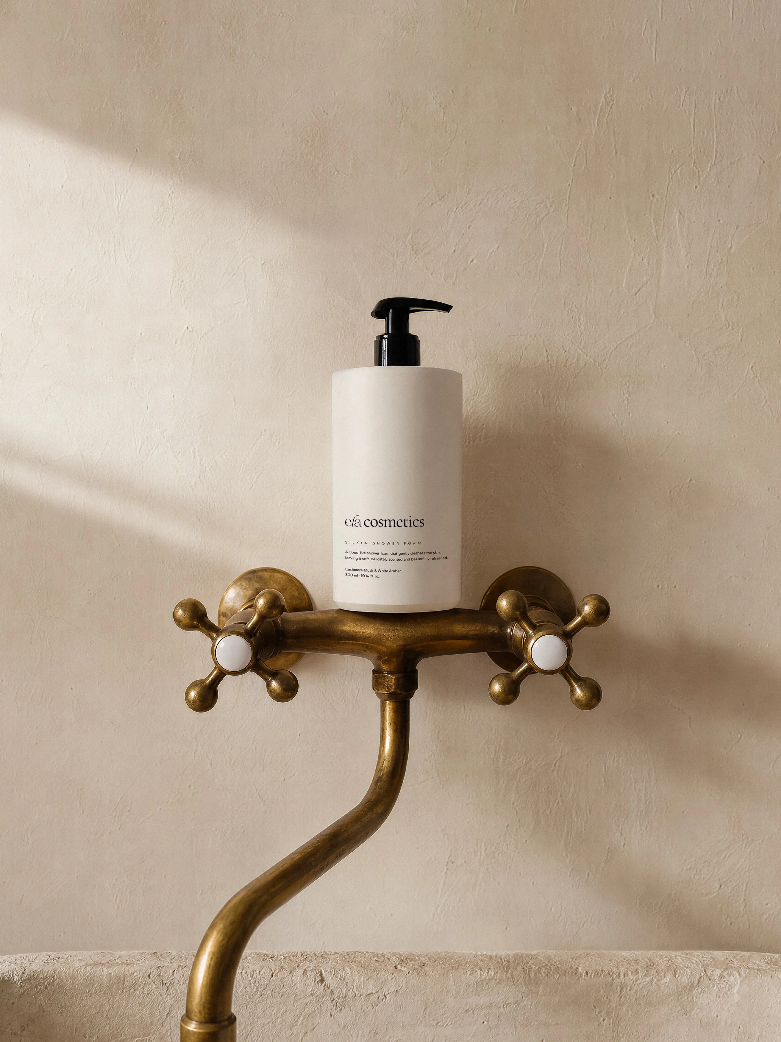 Not every beauty brand needs to shout.

For Ela Cosmetics, we built an identity around restraint &mdash; a logotype that moves like a gesture, a palette that behaves like skin, packaging that disappears into the ritual instead of interrupting it.

Th
