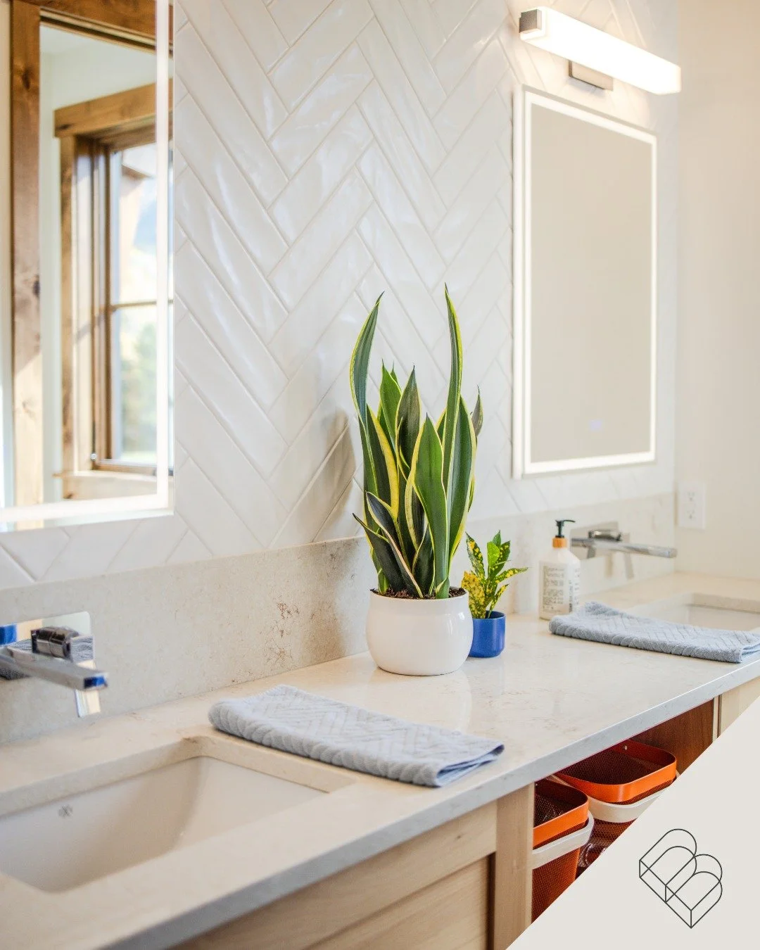 Herringbone was everywhere in 2024, and it&rsquo;s still trending strong in 2025 &mdash; though with a softer, more natural twist. In this primary ensuite of Ghostrider Views custom build, the textured tile backsplash creates a subtle statement behin