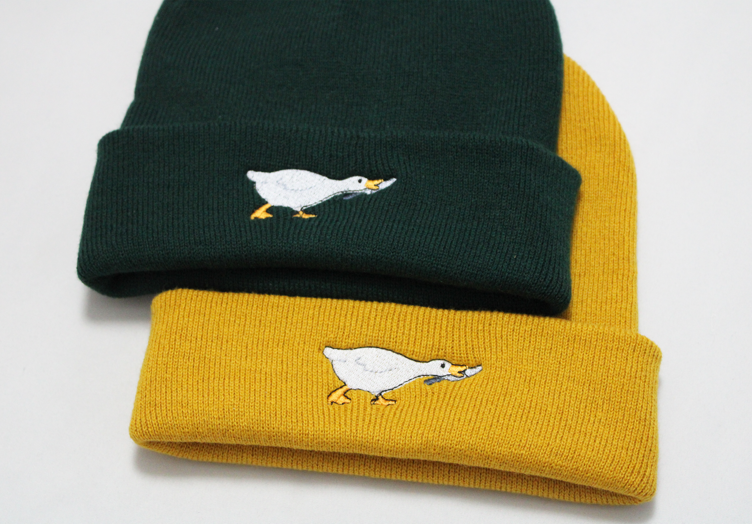 Murder goose beanies mustard and bottle 1.png