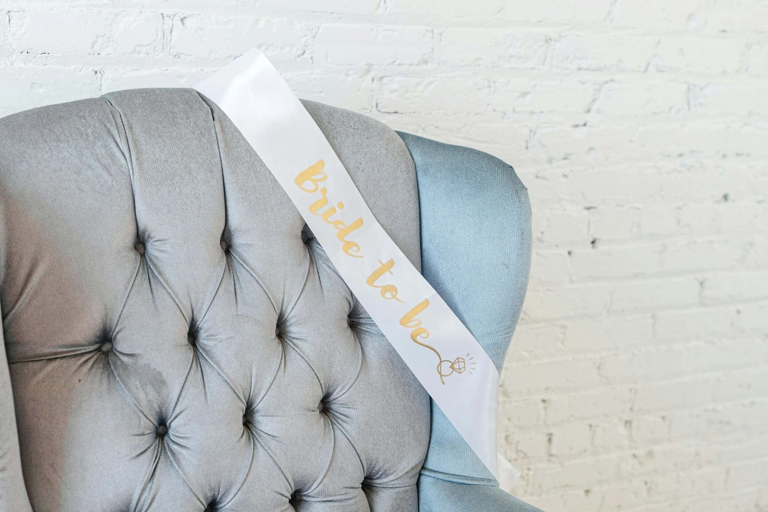chair with "bride to be" sash