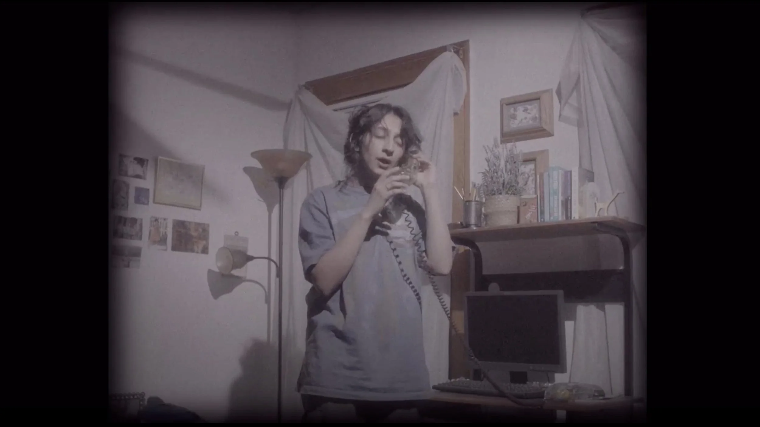 quainat on phone, wide.jpeg