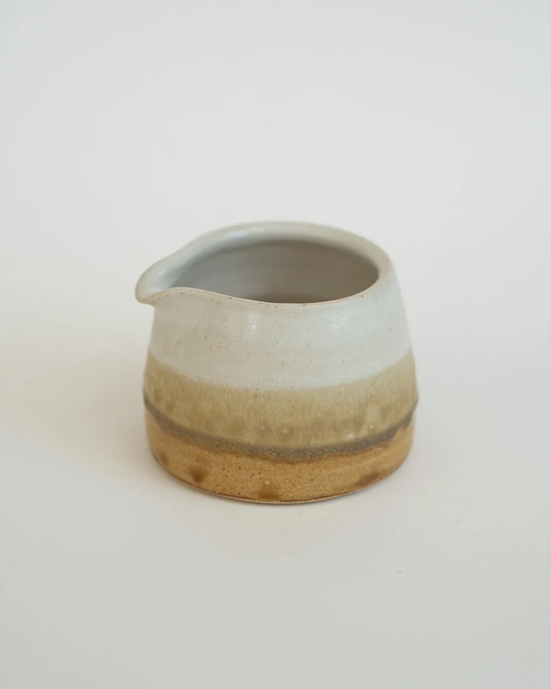 Small white and yellow jug
