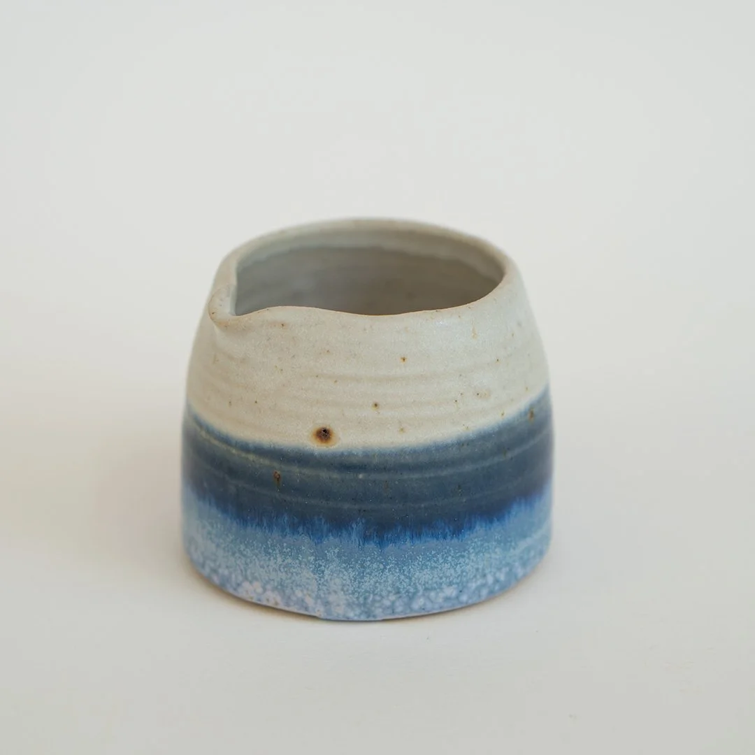 Small white and blue jug
