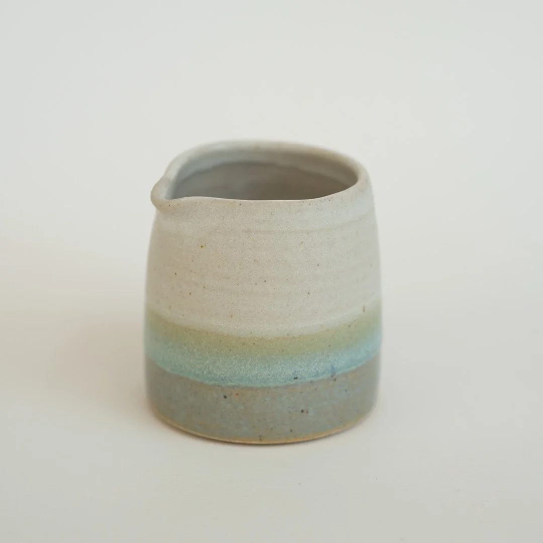 Small white and seafoam jug