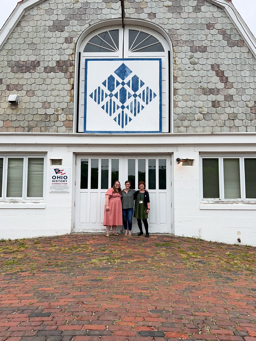 Audrey Esarey, Kelly Spell, and Heather Pregger outside the Dairy Barn Arts Center in Athens, Ohio.