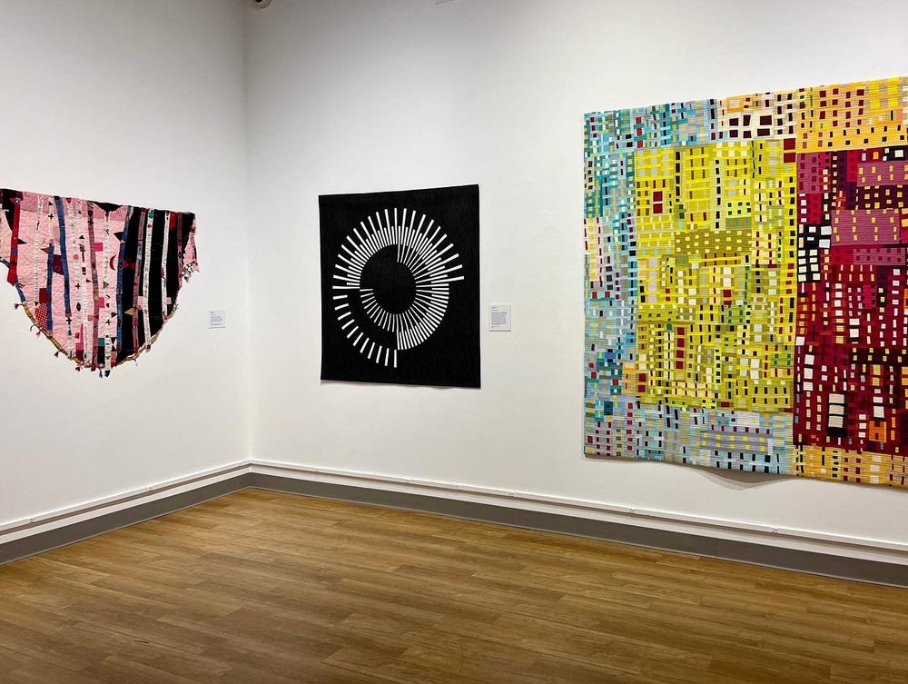 Quilts by Helen Geglio, Audrey Esarey, and Julia Graziano.