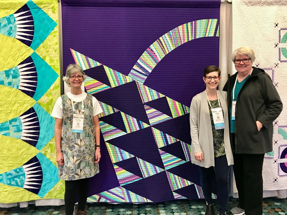  Audrey Workman, Jean Larson and me with ChattMQG's modern basket quilt. 