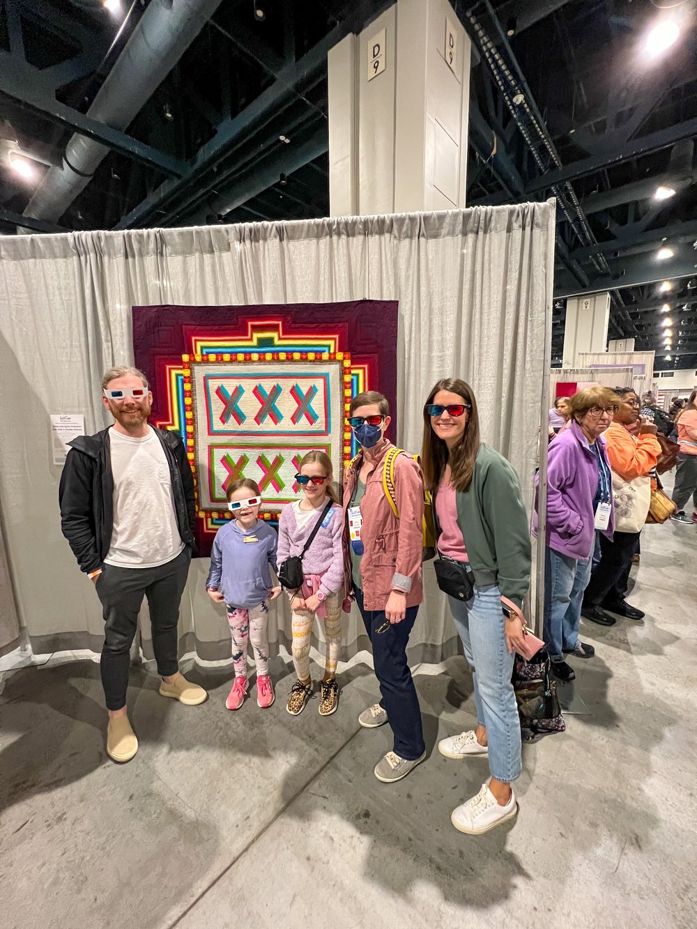 Checking out the quilt called "Debbie Does Quilts Presents: A 3D, Triple-X, Double Feature" by Debra Milkovich