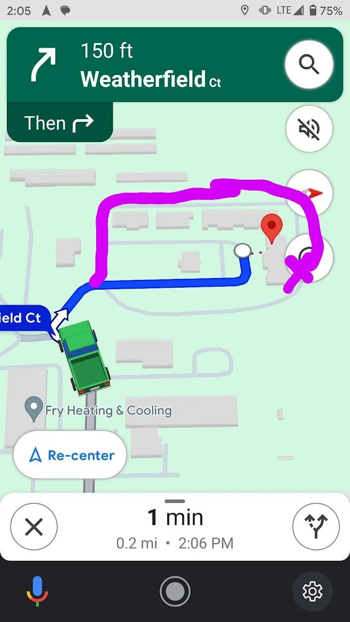 Navigation map display showing a route near Weatherfield Court, with a blue path for the current route and a purple path for a detour. The map includes a green vehicle icon, street names, and a red marker indicating a destination or point of interest. The top shows navigation instructions and route distance, along with control icons for search, voice, and map options.