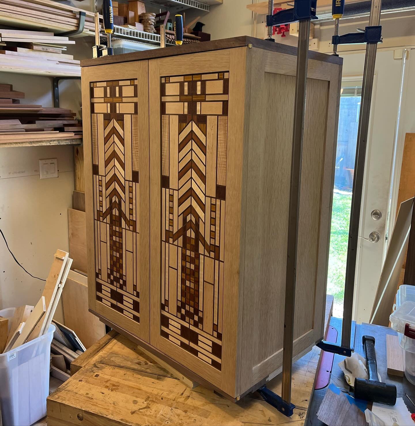 Clamping up! I waited to glue the top and bottom of the case together until I had the doors completed because it&rsquo;s so much easier to dial in the hinge positions. This way I know that the alignment and reveals will be in line. #atx #woodworking 