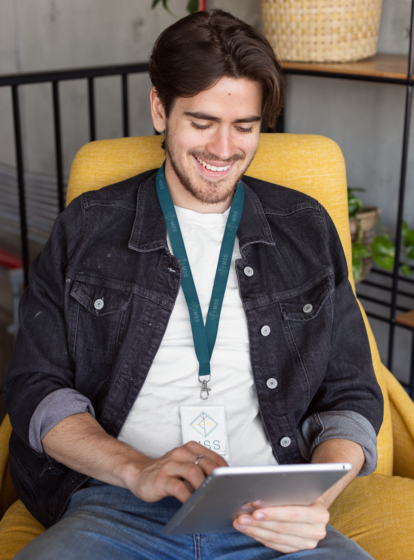 lanyard-mockup-featuring-a-man-checking-his-tablet-26535.png