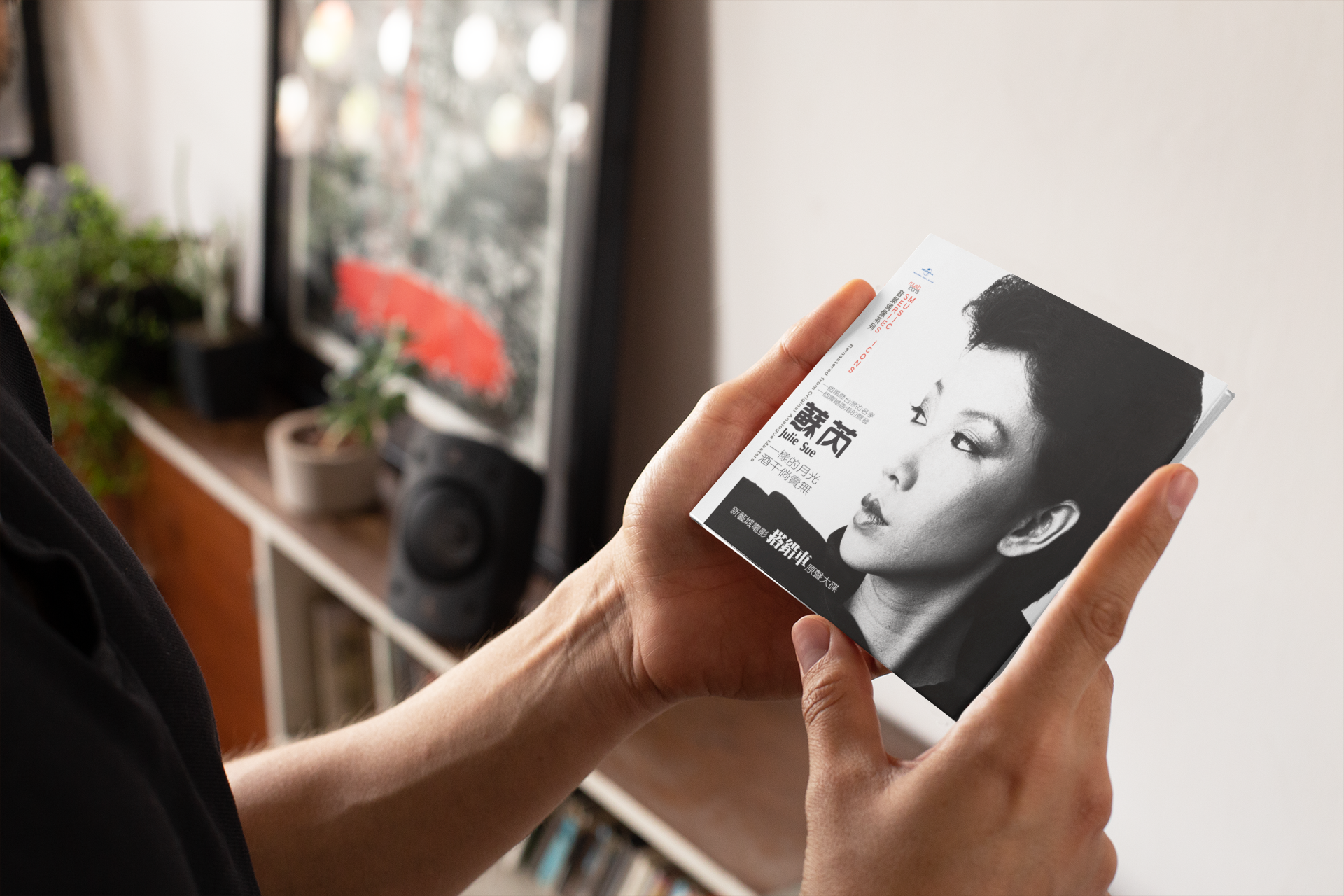 mockup-of-a-man-holding-a-digipak-28355.png
