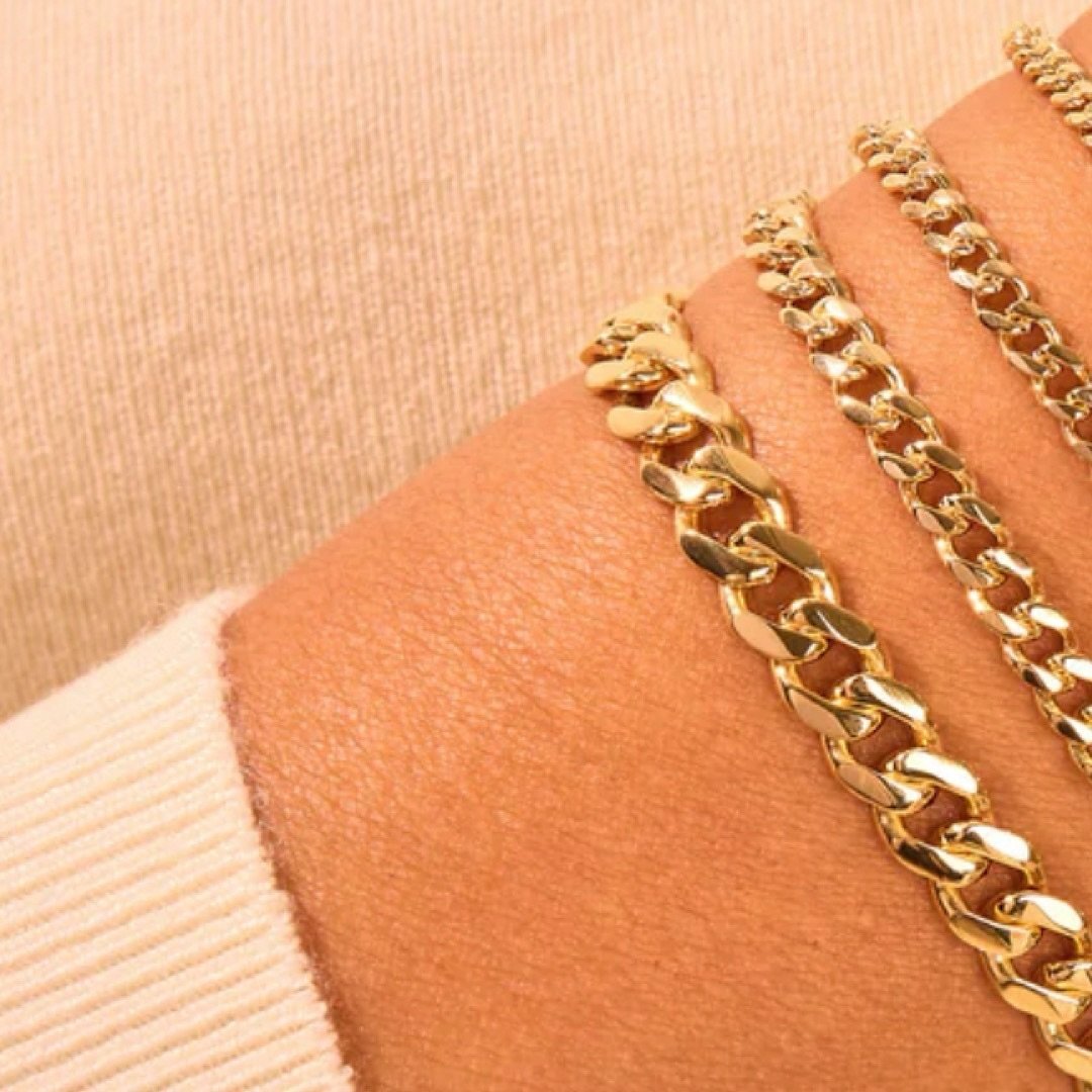 Thicker chains are dominating the style scene in 2024! Here are our top picks:

1. Bold Gold: Chunky 14k gold or gold filled chains add instant glamour to any outfit.
2. Silver Statement: Thick silver chains make a sleek and edgy statement.
3. Mixed 