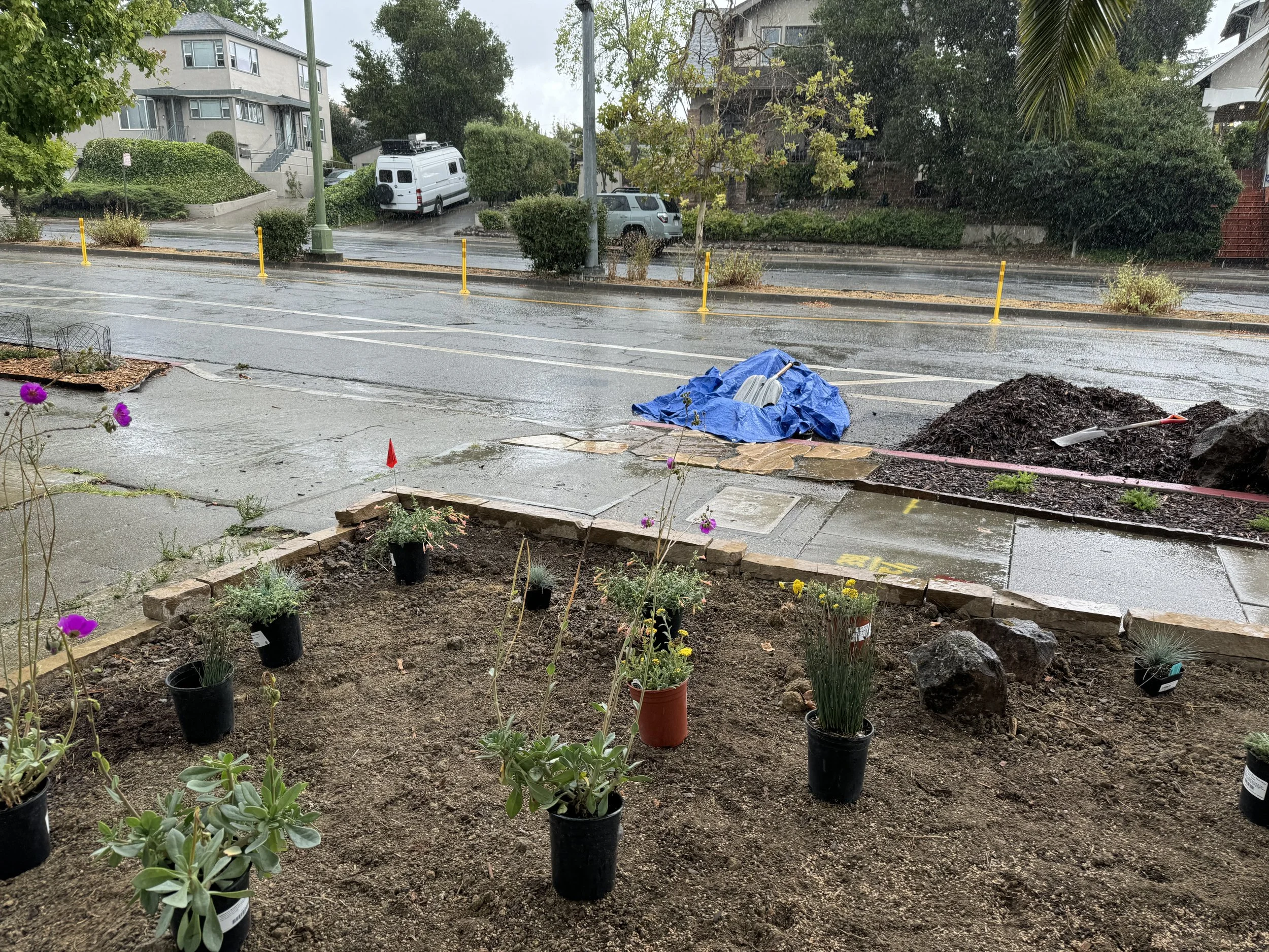 Installation by Oakland Stone Design briefly stopped during August rainstorm