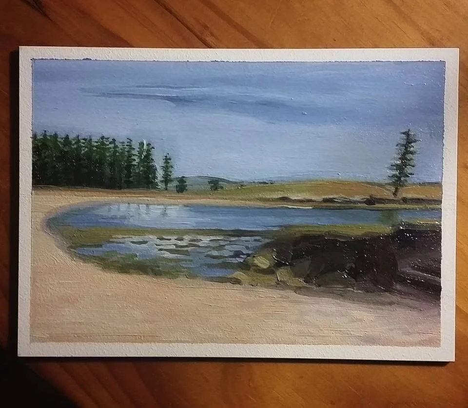 A landscape painting of a lake surrounded by trees and grassy fields under a cloudy sky.