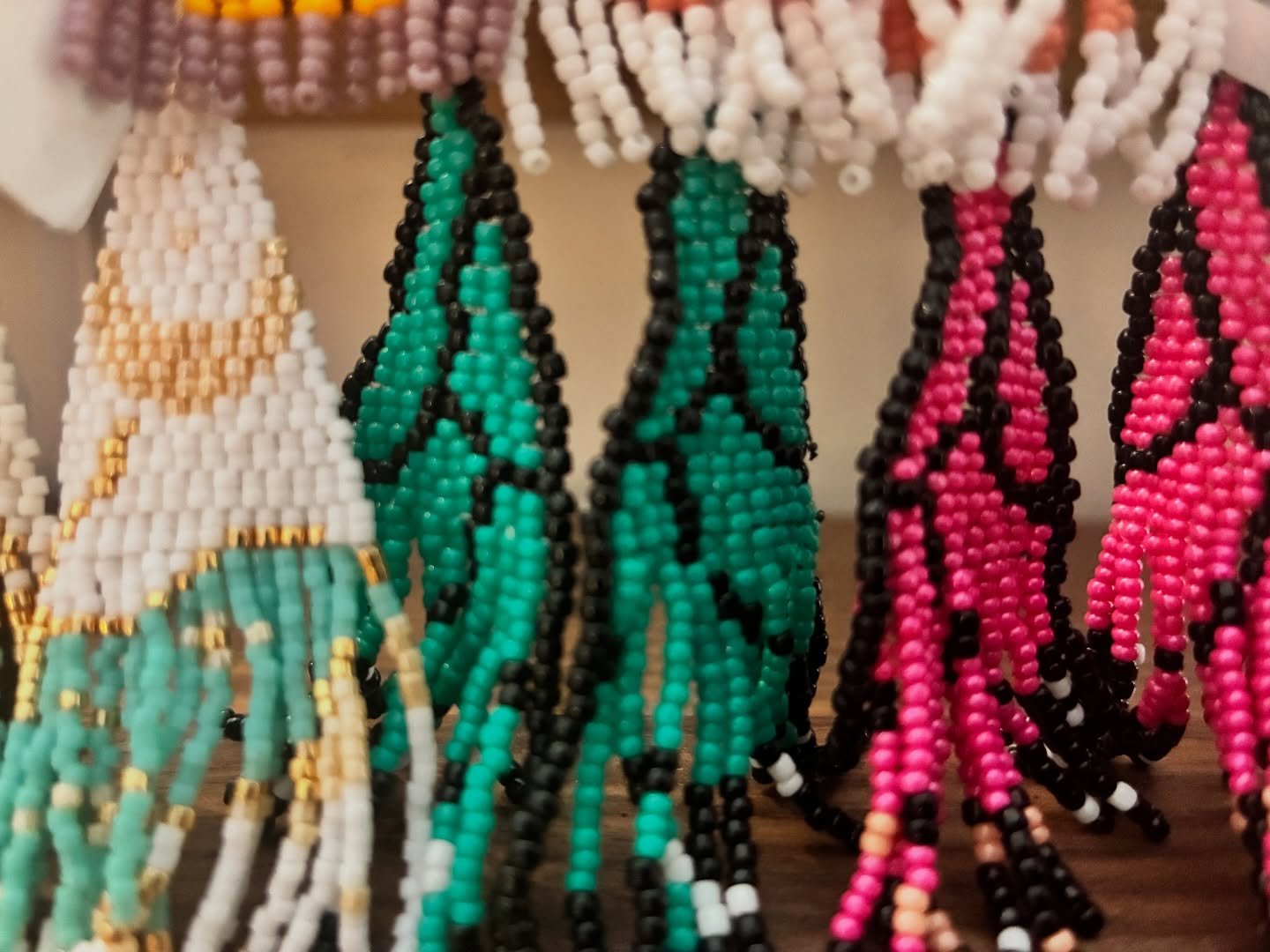 These beautiful beaded earrings are now in the Upside Down gift shop! ✨ Thanks to local artist @_tierrayluna for bringing more colorful, handmade wearables to our space. Stop by this weekend to experience Under The Mountain and shop local art! 💫