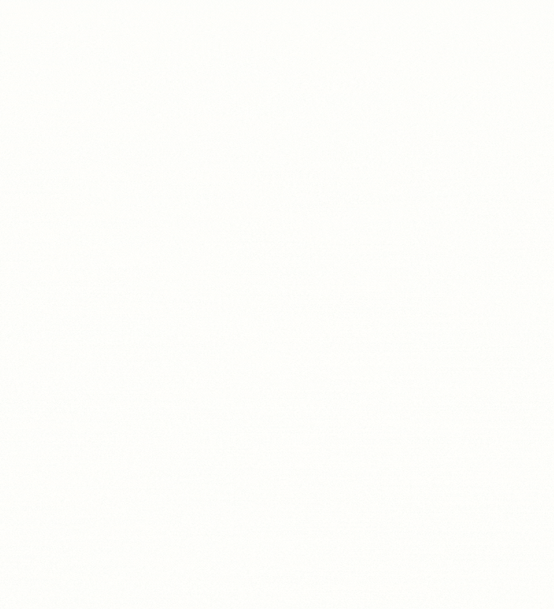 Empty white background with no objects or discernible features.