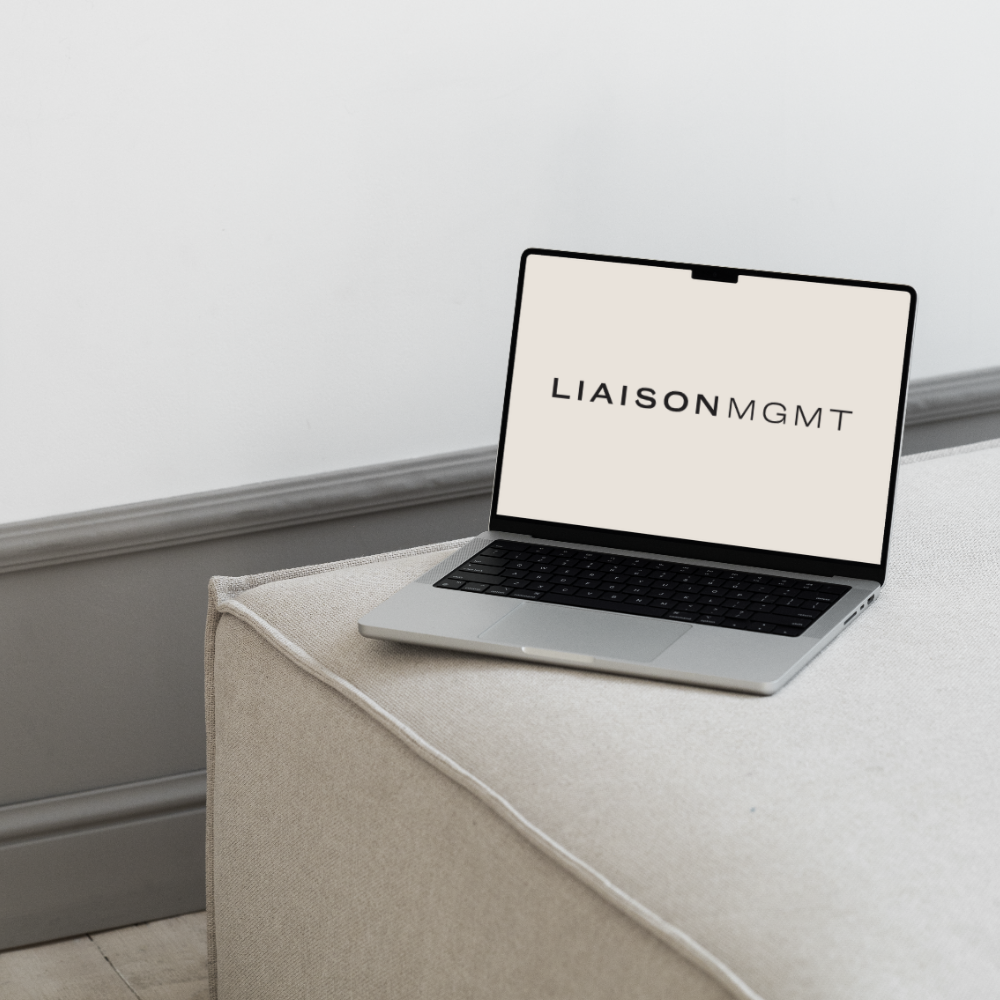 Liaison Management branding shown on a laptop